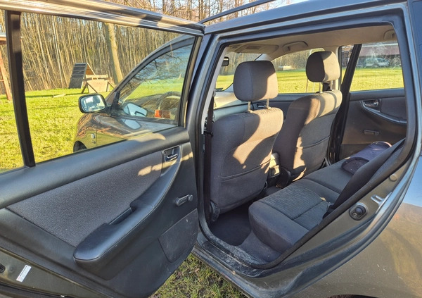 Toyota Corolla cena 7500 przebieg: 311000, rok produkcji 2003 z Strzelce Opolskie małe 121